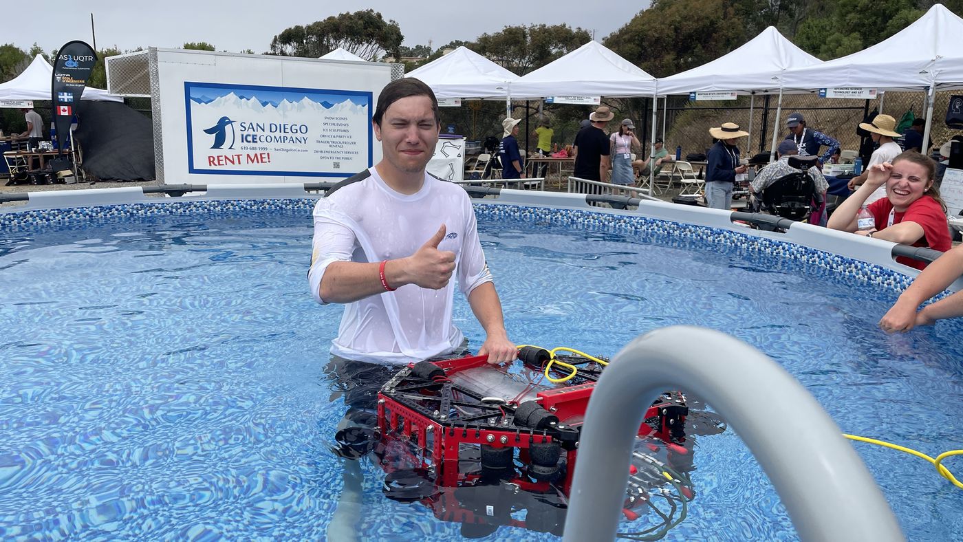 Taylor Randall, Mechanical Sub-Team Member, in the practice pool with SeaWolf VIII